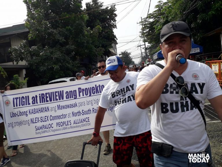 Manila residents march vs impending eviction threat