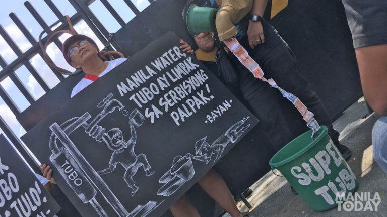 BAYAN protests water shortage at Manila Water office BAYAN protests water shortage at Manila Water office