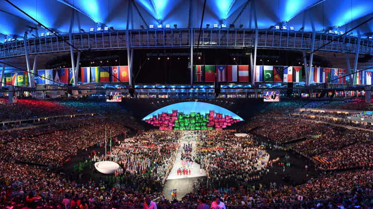 Athletes parade in empty stadium as Tokyo Olympics opens in shadow of pandemic