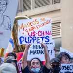 Anti-Marcos-Duterte-placard-M.-Aguas